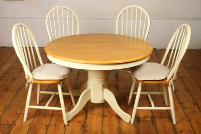 Lot 577 - A white painted kitchen extending table and...