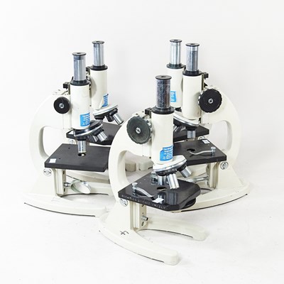Lot 321 - A collection of five student's microscopes,...