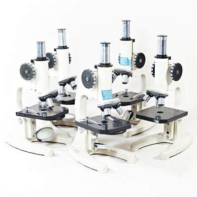 Lot 431 - A collection of five student's microscopes,...