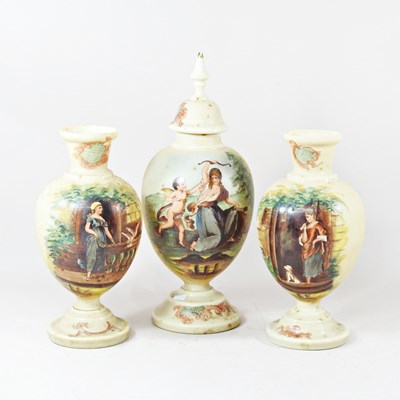 Lot 609 - A garniture of three early 20th century French...