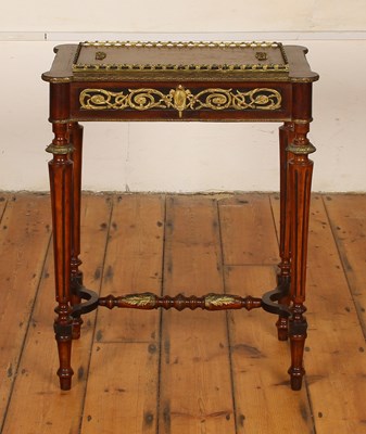 Lot 512 - A Victorian walnut jardiniere, having gilt...