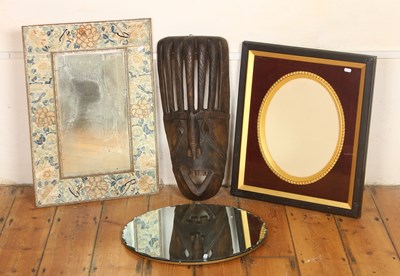 Lot 703 - An African carved hardwood tribal mask,...