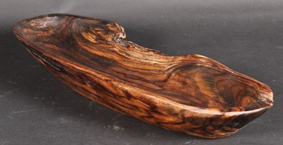 Lot 612 - A carved hardwood bowl, l.48cm