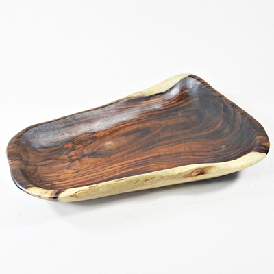 Lot 473 - An Eastern carved hardwood bowl, 39cm wide