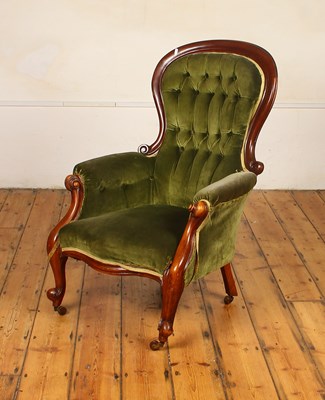 Lot 561 - A Victorian green upholstered mahogany armchair
