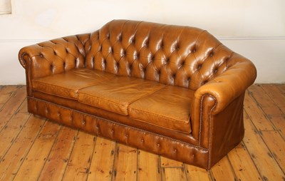 Lot 508 - A brown leather Chesterfield type button...