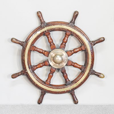 Lot 392 - An old brass mounted wooden ships wheel, 75cm...