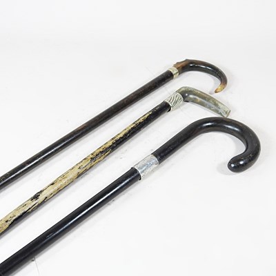 Lot 21 - A Victorian walking stick with a silver collar,...