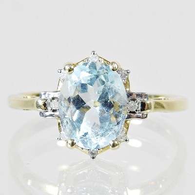 Lot 678 - A 9 carat gold aquamarine and diamond ring,...