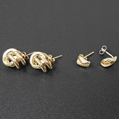 Lot 505 - A pair of 9 carat gold earrings, of celtic...