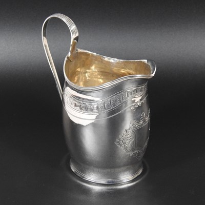 Lot 267 - A George III silver cream jug, of barrel shape,...