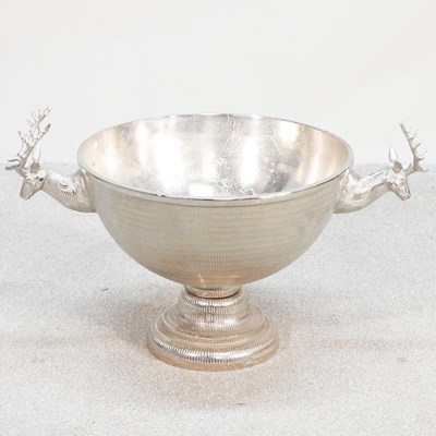 Lot 133 - A large white metal bunch bowl, flanked by...