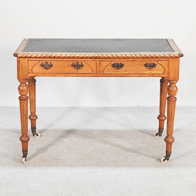 Lot 361 - A Victorian fruitwood marble top writing table,...