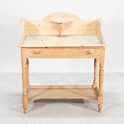 Lot 227 - An antique stripped pine washstand, on turned...