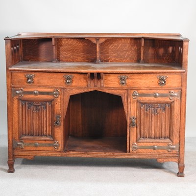 Lot 328 - An Arts & Crafts oak sideboard, in the manner...