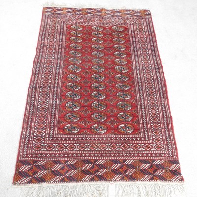 Lot 439 - A Bokhara rug, with three rows of medallions,...