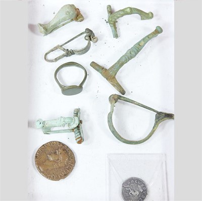 Lot 411 - A collection of Roman fragments, to include a...