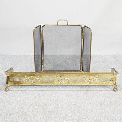 Lot 206 - A 19th century pierced brass fender, 127cm...