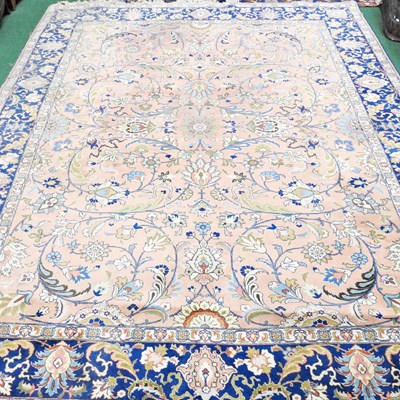 Lot 709 - A large Persian kashan carpet, with scrolled...