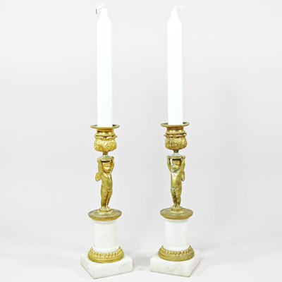 Lot 333 - A pair of gilt metal and white alabaster...