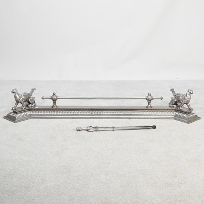 Lot 659 - A hand forged polished steel fender, with a...