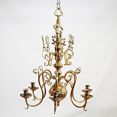 Lot 584 - A large and ornate Dutch brass six branch two...