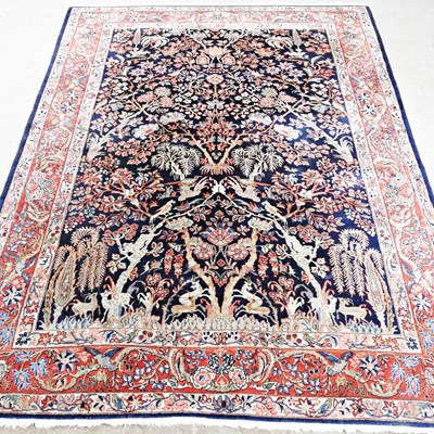 Lot 562 - An Isfahan carpet, decorated with the tree of...
