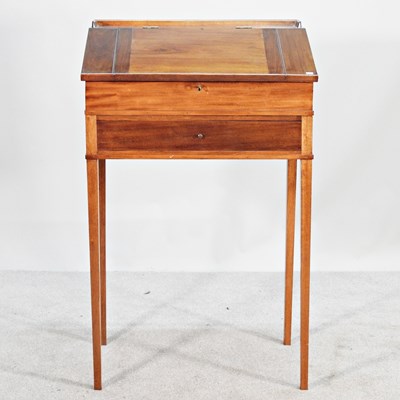 Lot 305 - An early 20th century cherrywood clerk's desk,...
