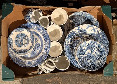 Lot 661 - A collection of blue and white pottery and...