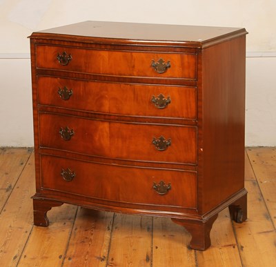 Lot 510 - A Georgian style mahogany serpentine chest of...