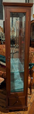 Lot 528 - A hardwood glazed display cabinet