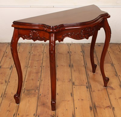Lot 616 - A French style mahogany console table