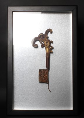 Lot 502 - An Indonesian batik tool, framed