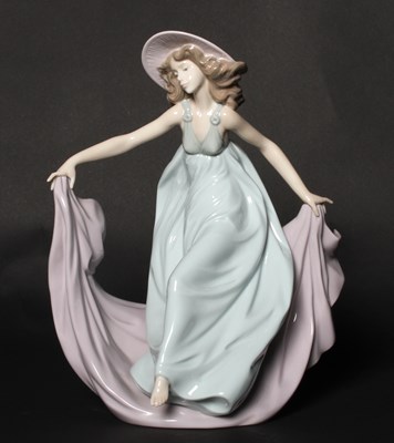 Lot 201 - A Lladro porcelain figure depicting a young...