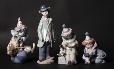 Lot 203 - A Lladro porcelain figure of clowns playing...