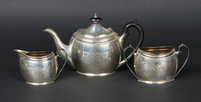 Lot 47 - A George V silver tea set, comprising teapot,...