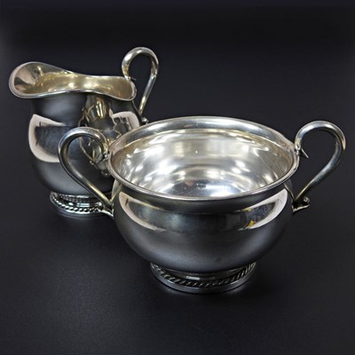 Lot 18 - An early 20th century Danish silver cream jug,...