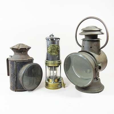 Lot 372 - A brass miner's lamp, by Thomas & Williams,...