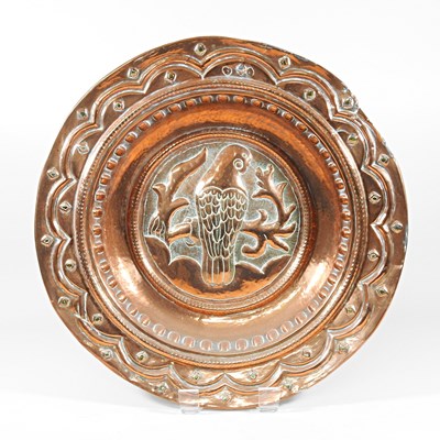 Lot 22 - An Arts and Crafts Newlyn style copper charger,...