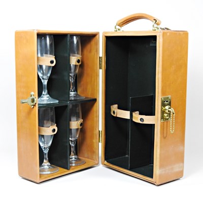 Lot 538 - An Asprey leather wine carrier, with a fitted...