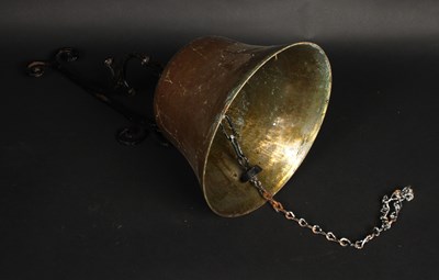Lot 750 - A cast iron wall mounted brass bell