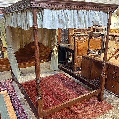 Lot 671 - A modern hardwood four poster double bedstead,...