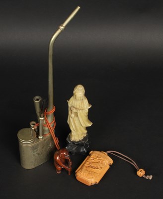 Lot 190 - A silver metal opium pipe with engraving of a...