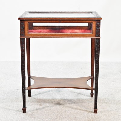 Lot 435 - An Edwardian bijouterie table, with blind fret...