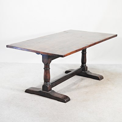 Lot 563 - A mid 20th century elm refectory dining table,...
