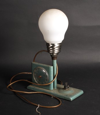 Lot 238 - An Art Deco combined table lamp and alarm...