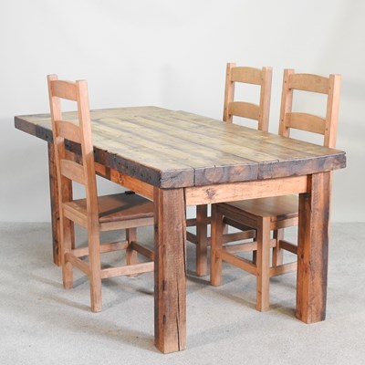 Lot 534 - A pine dining table, with additional leaf,...