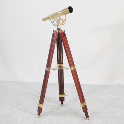 Lot 571 - A modern Celestron brass telescope, 39cm long,...