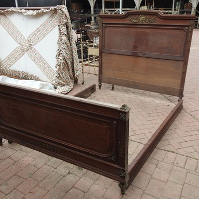 Lot 60 - An early 20th century French brass mounted bed