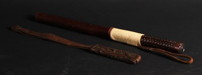 Lot 236 - A hardwood truncheon or cosh, having a chip...